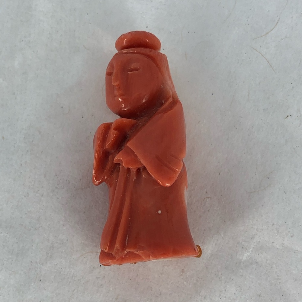 Vintage hand carved coral Buddha